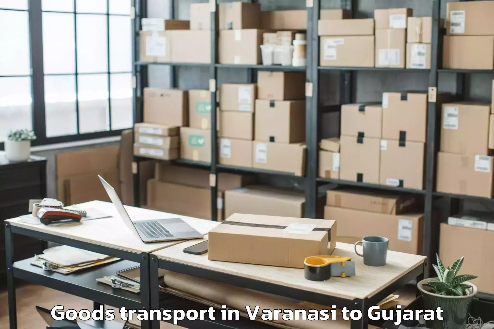 Top Varanasi to Sanand Goods Transport Available